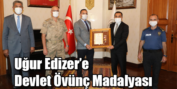 GAZİ EDİZER' ÖVÜNÇ MADALYASI VERİLDİ